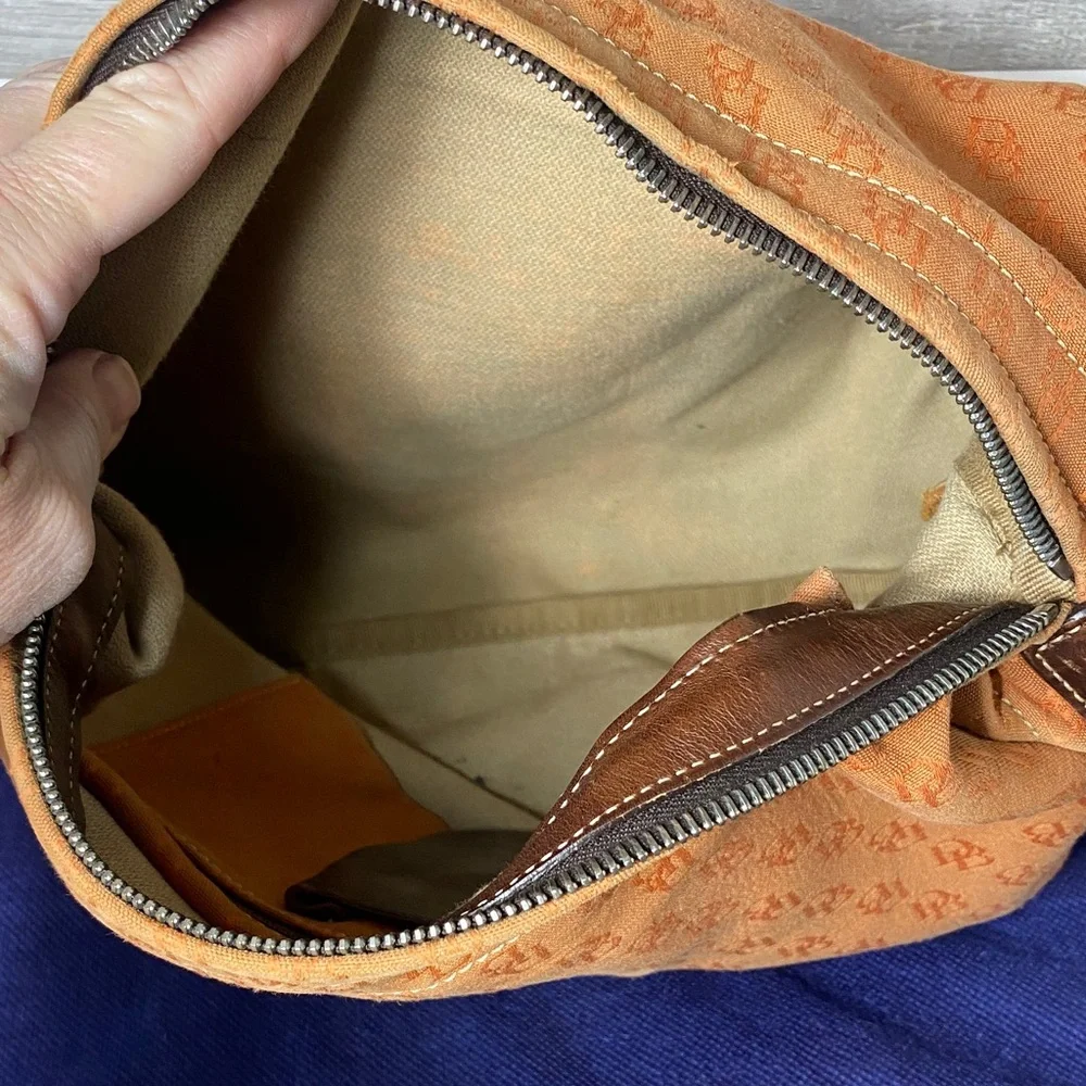 Dooney & Bourke Vintage burnt Orange over the shoulder bucket Bag